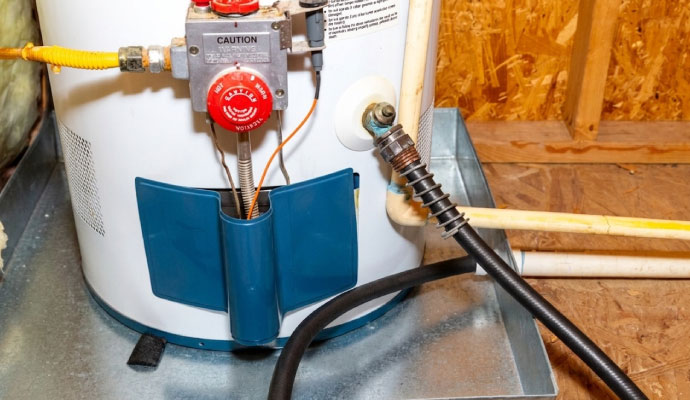 Gas water heater drain with hose connected