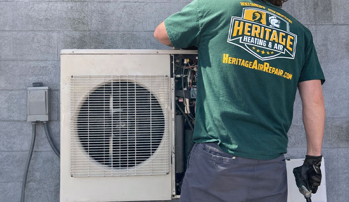 Heritage Heating and Air professional installing new residential AC