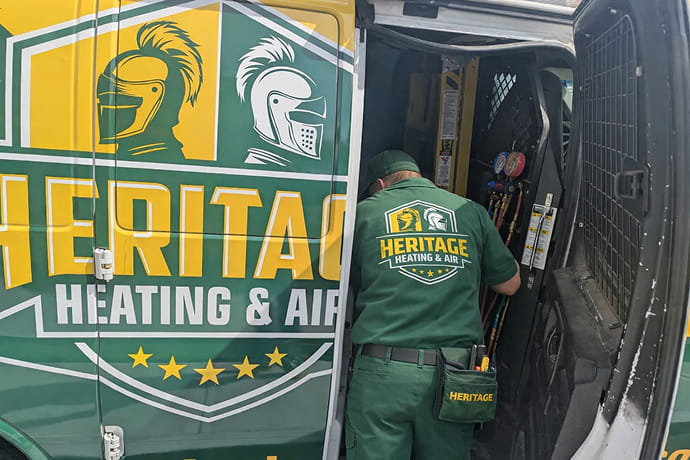 Heritage technician on site for HVAC service
