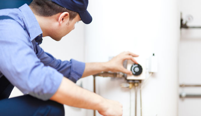 Technician performing heating tune up